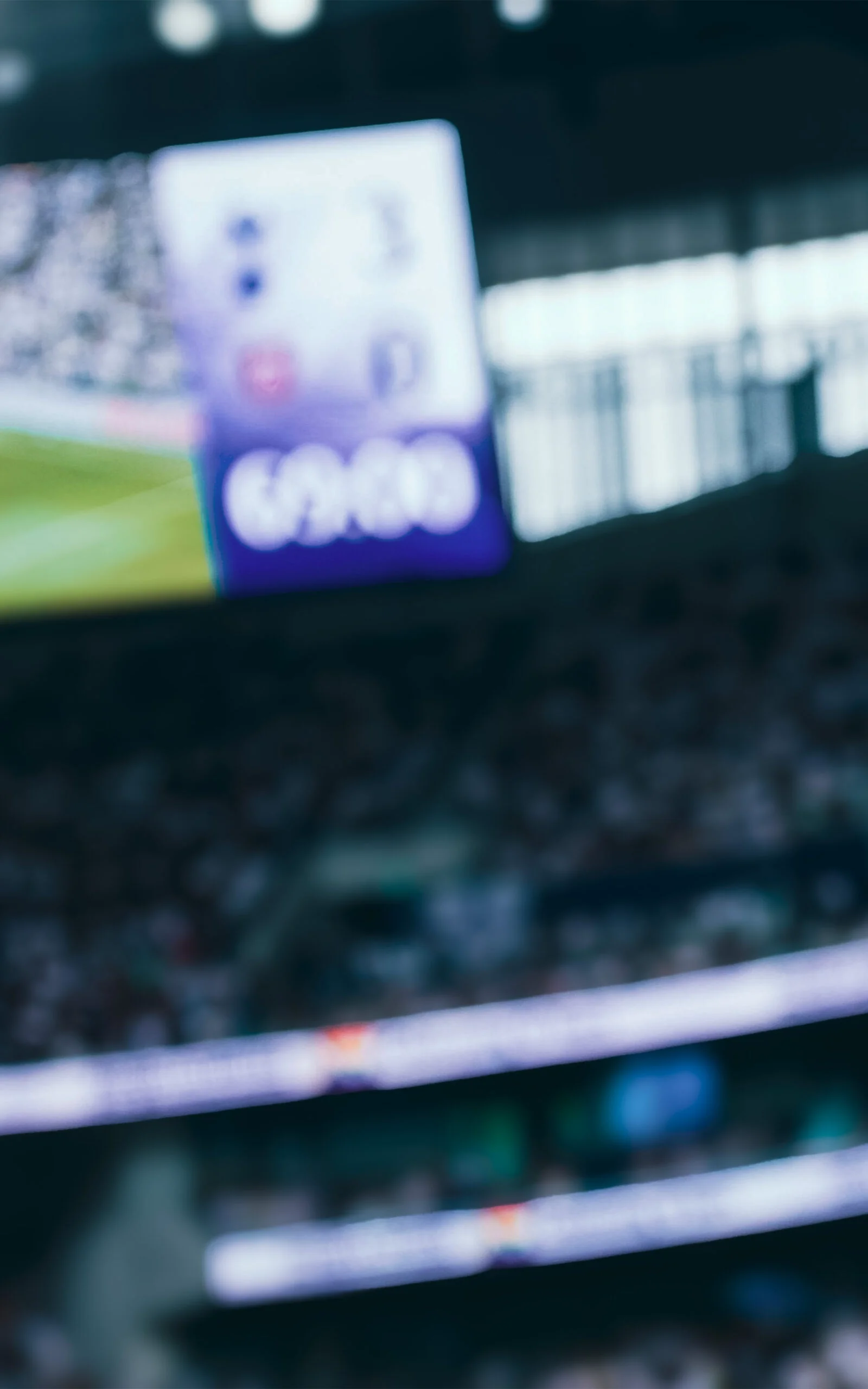 Mohammed Kudus in West Ham United kit standing in front of London Stadium - represented ROOF - Representatives of Outstanding Footballers.